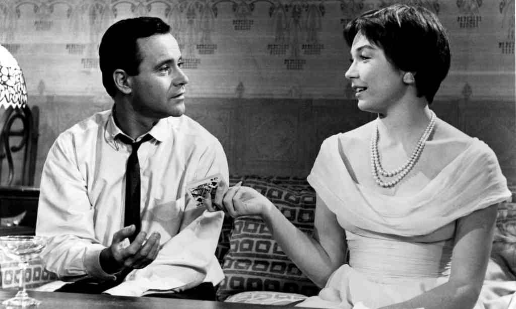 Shirley MacLaine (right) and Jack Lemmon (left) playing cards in Billy Wilder's The Apartment (1960).