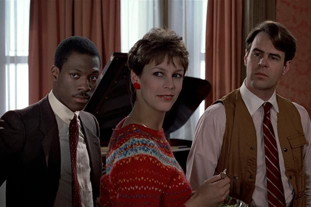 (From left to right) Eddie Murphy, Jamie Lee Curtis and Dan Ackroyd in Trading Places (1983).